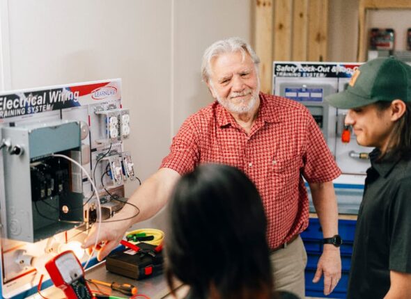Unitech Electrical instructor demonstrating skills to students