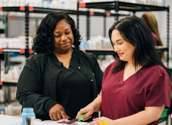 Unitech Training Academy pharmacy technician instructor with student