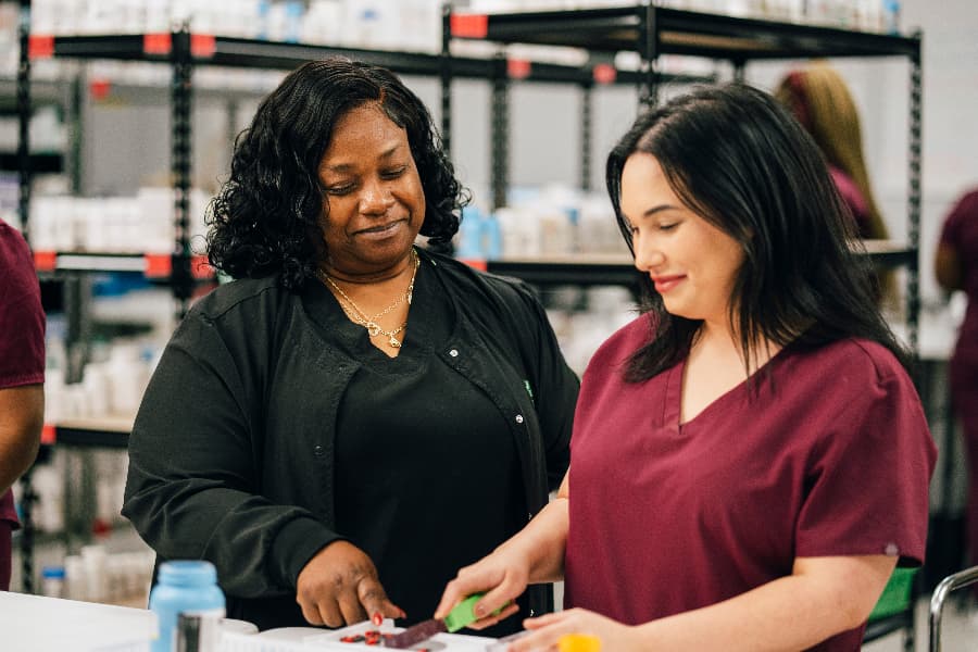 Unitech Training Academy pharmacy technician instructor with student